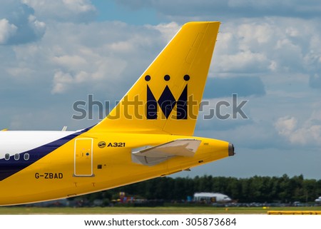 MANCHESTER, UNITED KINGDOM - AUG 07, 2015: Monarch Airlines Airbus A321 tail livery at Manchester Airport Aug 07 2015.