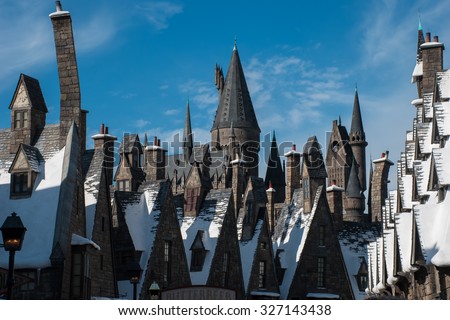ORLANDO, USA - AUGUST 27, 2015: Snow covered roofs of Hogsmead at The Wizarding World Of Harry Potter at Universal Studios Orlando. Universal Studios Orlando is a theme park in Orlando, Florida, USA.