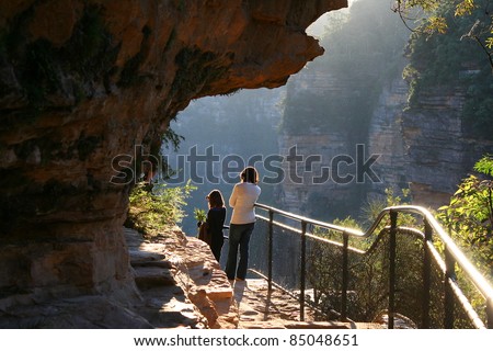 Girl and woman observing beautiful landscapes of Blue Mountains, Australia.