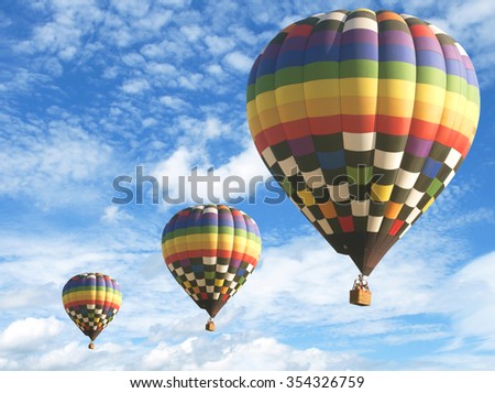 Colorful hot air balloons flying over the vast, beautiful sky.
