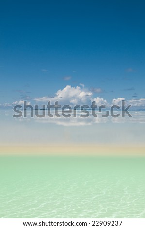 Split image of sky and sand under water