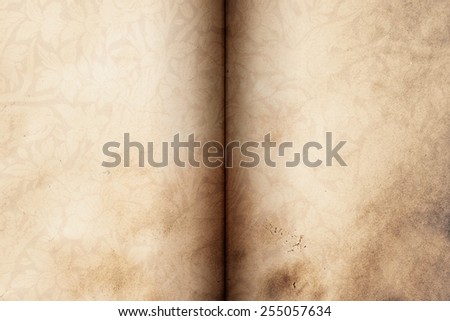 thai pattern in old book opened, old paper texture background