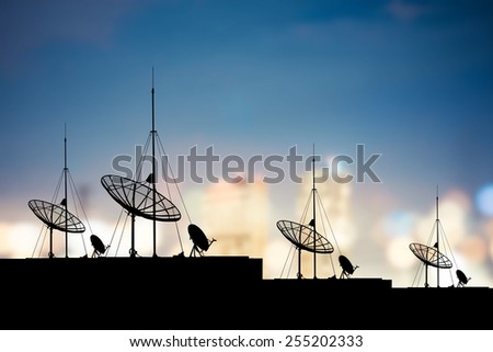 Silhouette Satellite dish in city communication technology network image