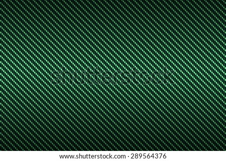 carbon kevlar texture background with green