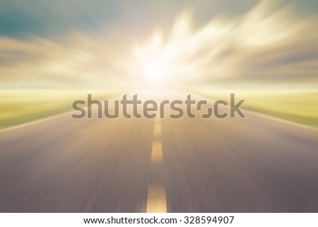 blur high speed road with cloudy sky and sunlight background at evening