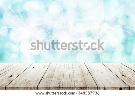 Empty wood table top on blurred Christmas and Happy New Year background. can montage or display your products