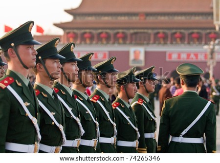 BEIJING - MAY 1: Chinese soldiers  on celebration of May 1 Day, 2010 in Beijing, China. Here officers inspect soldiers.