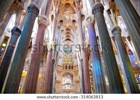 BARCELONA, SPAIN - MAY 02: Low Angle View of Pillars and Ceiling - Architectural Interior of Sagrada Familia Church, Designed by Antoni Gaudi, Barcelona, Spain. May 02, 2015.