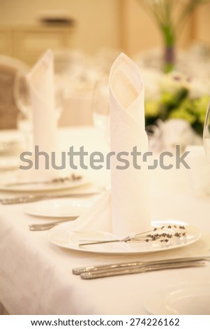 Wedding table setting. Table set for an event party or wedding reception.