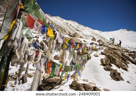 Prayer flags at Chang La Pass, the third highest driveable mountain pass in the world 5300m. above sea level, Ladakh, jammu & kashmir, India