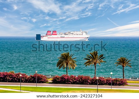 Passenger ship sails along the promenade with palm trees. Passenger ship sails along the promenade with palm trees against the blue sky and beautiful clouds.