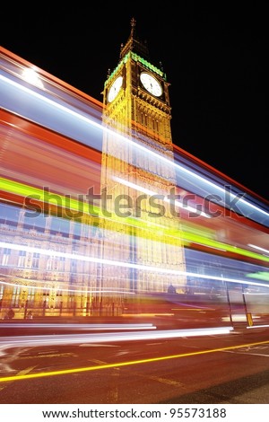 Big Ben at night with bus in motion blur