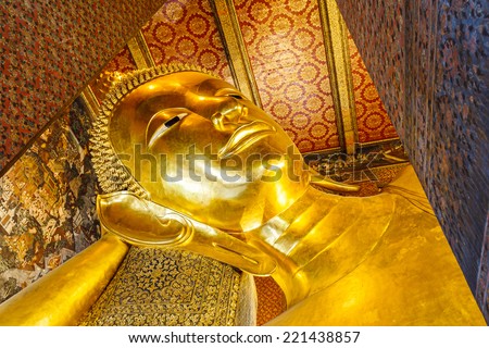 Reclining Buddha gold statue face