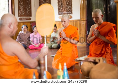 BANGKOK,THAILAND January 19: Newly ordained Buddhist monk pray with priest procession. Newly ordained Buddhist monks have a ritual in the temple procession in January 19, 2015