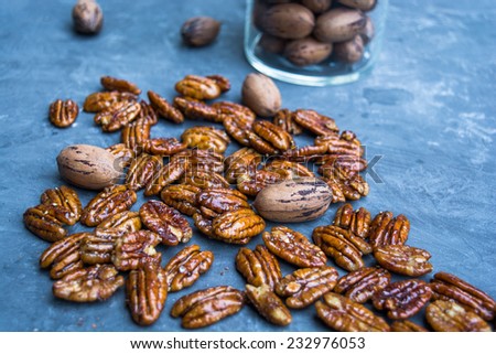Raw Candied Pecans coated with one hundred percent maple syrup with whole shelled pecans