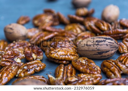 Raw Candied Pecans coated with one hundred percent maple syrup with whole shelled pecans