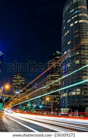 Light streaks from cars and a bus in downtown Dallas