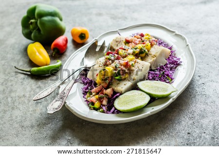 Decontructed Fish Tacos on a bed of cabbage
