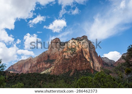 Large Mountainous Rock Rising from the desert floor in Zion National Park