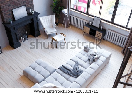 trendy modern design two-level \
apartment with large high windows. The stylish living room and kitchen in bright colors are undressed by a glass partition. bedroom on the second floor.