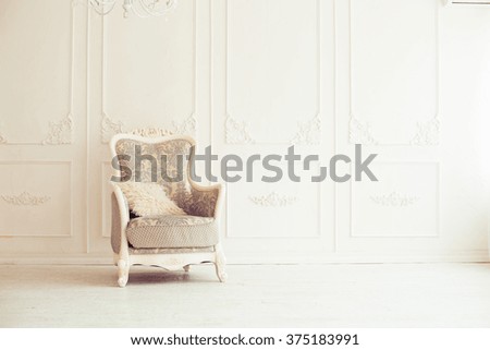 elegant armchair in luxury clean bright white interior