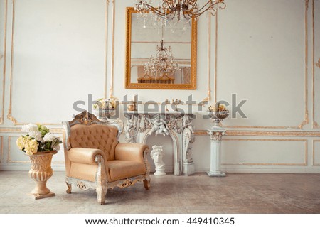 rich interior of studio with gold decorations on the walls