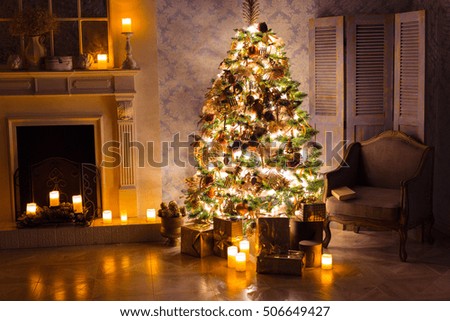 Luxury interior of living room with decorated Christmas tree and gifts on the wooden floor.