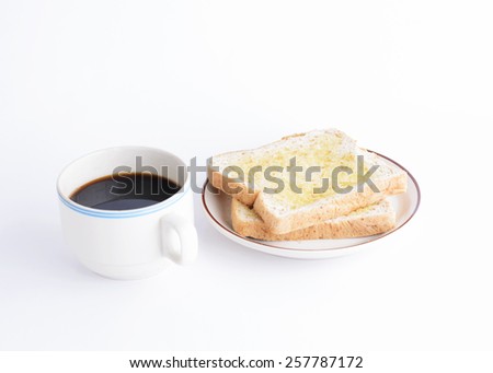 Coffee cup and sliced bread on white background