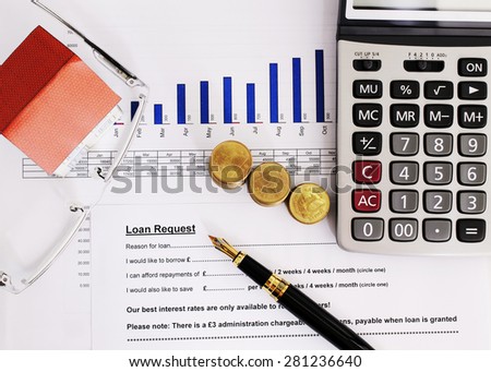 Loans concept with close up Fountain pen and coins stack and calculator and eyeglasses and paper house