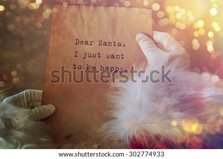 Santa with Christmas letter or wish list