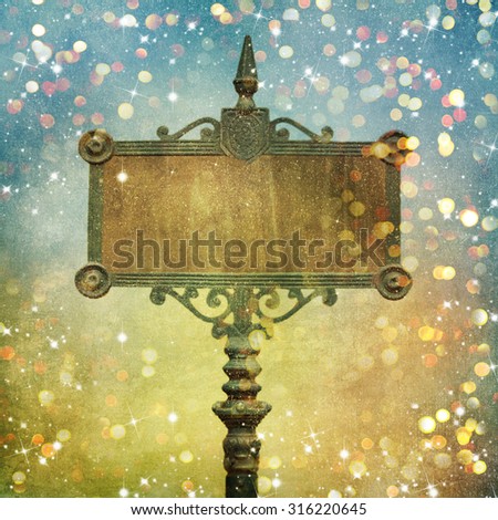 Signboard with Christmas greeting and light bokeh