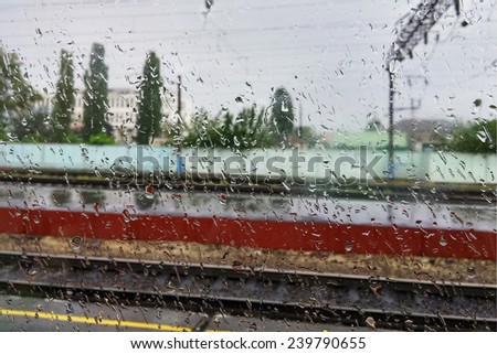 Rain at an electric train window