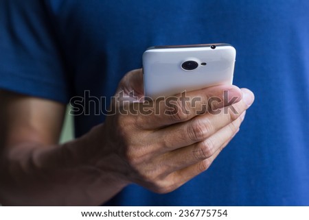 A man is using smart phone