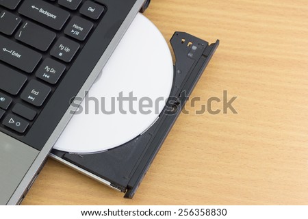 Laptop is open CD DVD drive and insert it to laptop