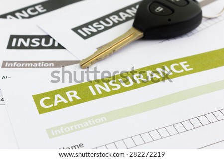 Car insurance form with car key
