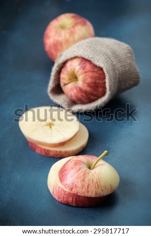 Apple cut on a blue background.Vintage Style