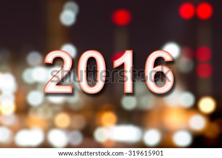 Happy new year 2016 writing 3D with dirty defocused light blur bokeh background