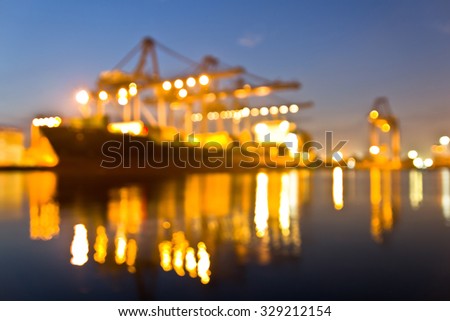 container ship in import,export port against beautiful morning light of loading ship yard use for freight and cargo shipping vessel transport