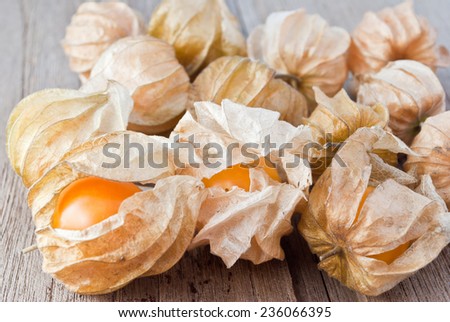 Cape gooseberry (Physalis)on wood table, healthy fruit and vegetable
