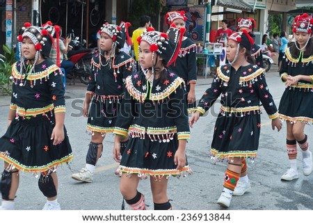 Lamphun, Thailand - June 25, 2014 : Women Dress Parade Drying In Thailand Festival Lamphun Province, Thailand.