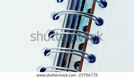open notebook with spiral rings, photo image