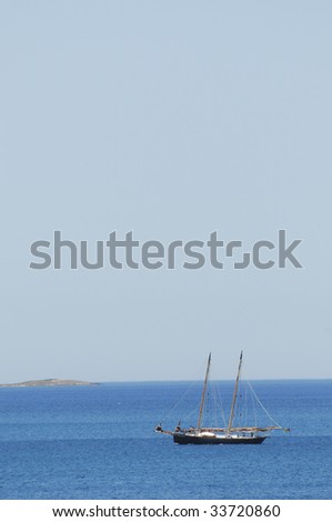 sailboat sailing on a beautiful blue sea in the mediterranean sea