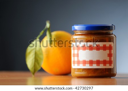 orange marmelade in a labelled and not branded can