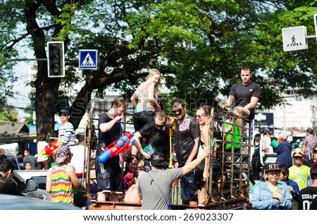 CHIANG MAI, THAILAND - APRIL 13, 2015: Tourists do not know the name playing water in Songkran festival on April 13, 2015 at Tha Pae Gate in Chiang mai