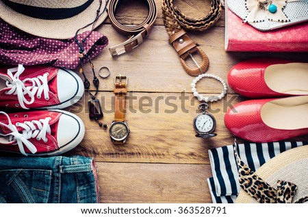 Clothing and accessories for men and women ready for travel.