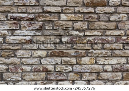 Irregular stone wall.