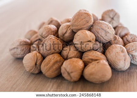A pile of walnuts, the best of the dried fruit.