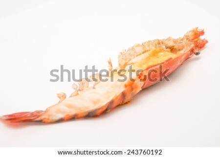 Close up of isolated delicious grilled or barbecued big shrimps / prawns for seafood background