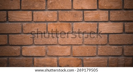 Vignetting of dark brown brick block for interior design background