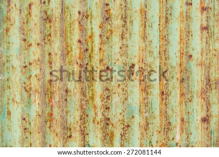 Brown green rusty metal plate for construction or barrier background